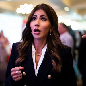 South Dakota Gov. Kristi Noem, walks to an interview during the second day of the Conservative Political Action Conference CPAC on Friday, Feb. 25, 2022 in Orlando, FL. 