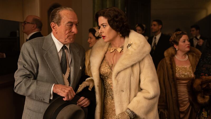 Robert De Niro as Frank Costello and Debra Messing as Bobbie Costello in The Alto Knights.
