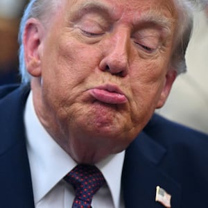 Donald Trump speaks signing an order sending National Guard troops to Memphis, in the Oval Office of the White House in Washington, DC, on September 15, 2025.