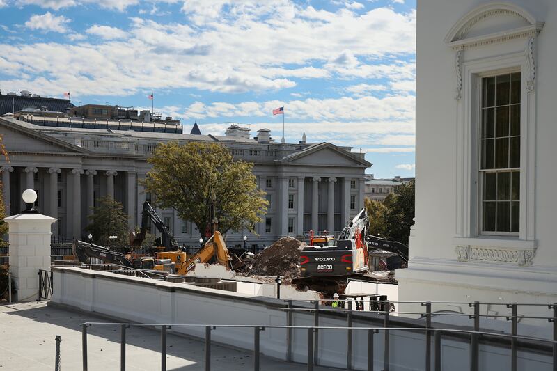 Excavators working to clear debris on October 31 after the East Wing of the White House was completely demolished this month.
