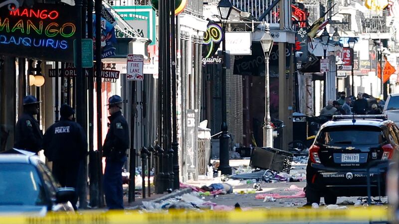Debris is left along Bourbon Street after a pickup truck was driven into a large crowd in the French Quarter of New Orleans, Louisiana.