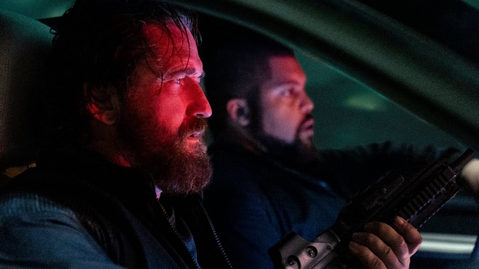 Gerard Butler as 'Big Nick' O'Brien and O’Shea Jackson Jr. as Donnie Wilson in Den of Thieves 2: Panthera.