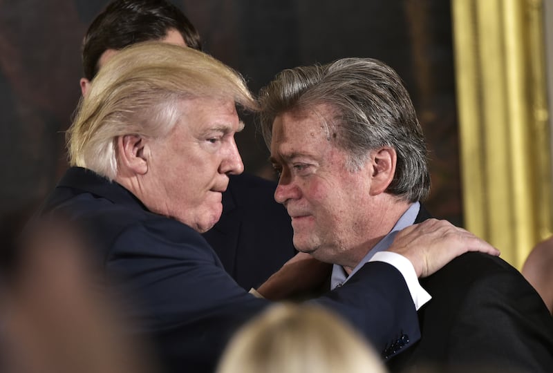 US President Donald Trump (L) and his then Senior Counselor to the President Stephen Bannon in 2017.