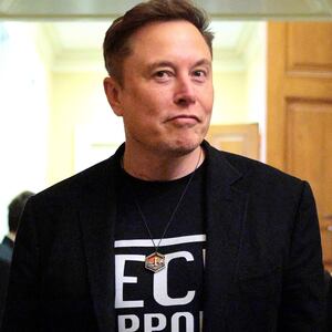 Elon Musk accompanied by DOGE adviser Katie Miller (left) leave a meeting with Senate Republicans on March 05, 2025.