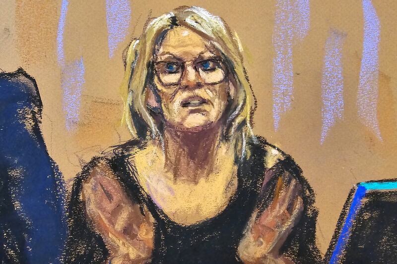 Stormy Daniels is questioned by prosecutor Susan Hoffinger during former U.S. President Donald Trump's criminal trial on charges that he falsified business records to conceal money paid to silence porn star Stormy Daniels in 2016, in Manhattan state court in New York City, U.S. May 7, 2024 in this courtroom sketch. REUTERS/Jane Rosenberg