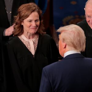 WASHINGTON, DC - MARCH 04: U.S. Supreme Court Associate Justices Brett Kavanaugh (L) and Amy Coney Barrett and former Associate Justice Anthony Kennedy talk with President Donald Trump as he arrives to address to a joint session of Congress at the U.S. Capitol on March 04, 2025 in Washington, DC. During his first address to Congress since returning to the White House for his second term, Trump outlined his legislative agenda, including $4 trillion in tax cuts, shrinking the size of the government and securing the southern border. (Photo by Chip Somodevilla/Getty Images)
