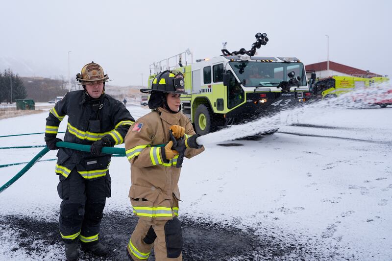 Kristi Noem participates in a firefighting drill