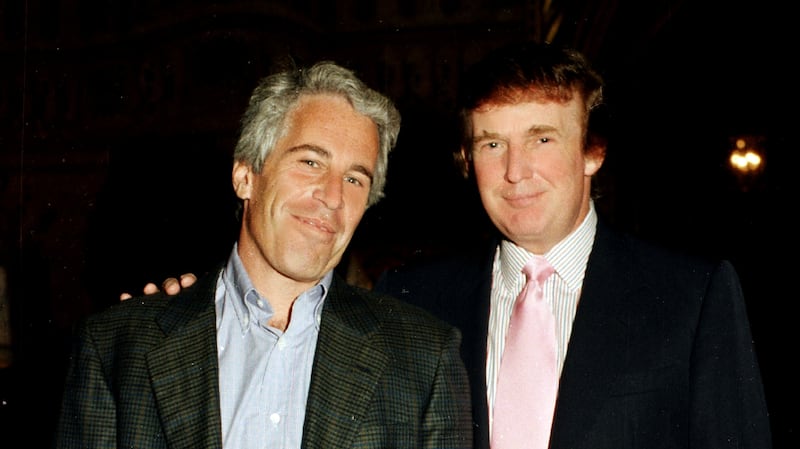 Jeffrey Epstein and Donald Trump pose together at the Mar-a-Lago estate in Palm Beach, Florida, 1997.