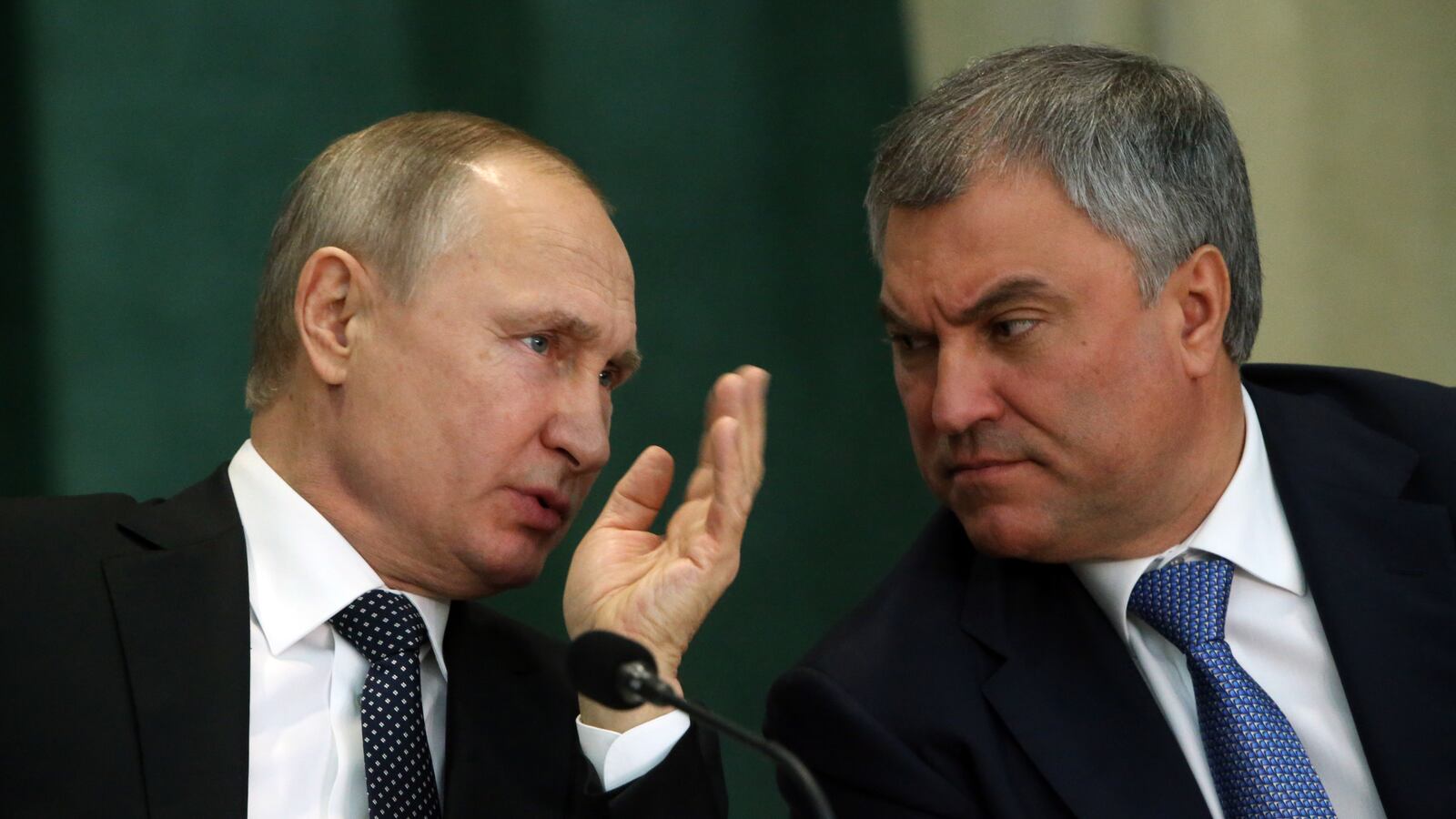 Russian President Vladimir Putin talks to State Duma Speaker Vyacheslav Volodin.