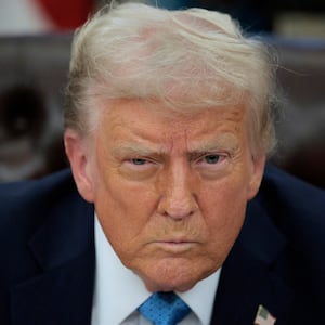 U.S. President Donald Trump talks to reporters in the Oval Office on January 31, 2025 in Washington, DC.