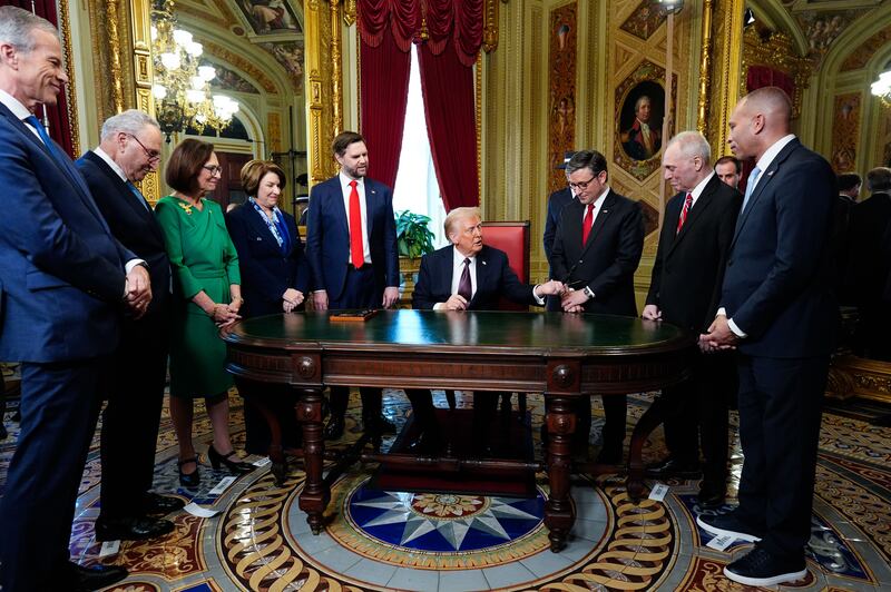 U.S. President Donald Trump takes part in a signing ceremony after his inauguration on January 20, 2025 in the President's Room at the U.S. Capitol in Washington, DC. Also in attendance are: Senate Majority Leader Sen. John Thune (R-S.D.), Senate Minority Leader Sen. Chuck Schumer (D-N.Y.), Sen. Deb Fischer (R-NE), Sen. Amy Klobuchar (D-MN), Vice President JD Vance, Melania Trump, House Speaker Mike Johnson (R-LA), House Majority Leader Steve Scalise (R-LA) and House Minority Leader Hakeem Jeffries (D-NY).