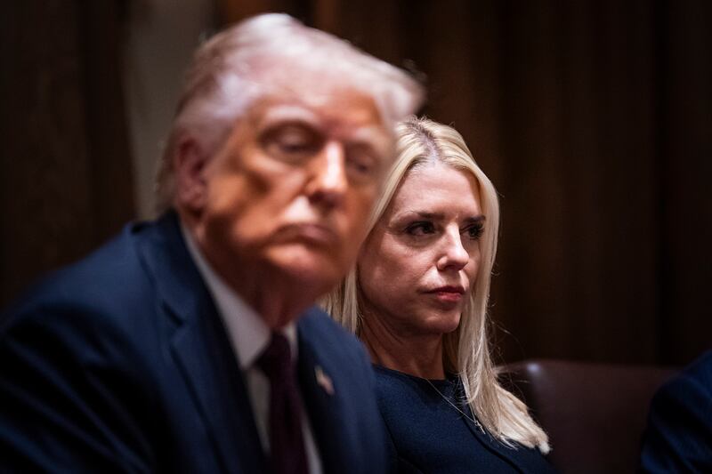 President Donald J Trump, flanked by Attorney General Pam Bondi, speaks during a cabinet meeting at the White House on March 24, 2025 in Washington, D.C.