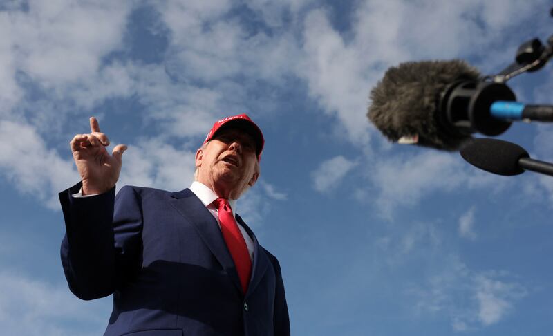 President Donald Trump speaks to reporters upon arrival in West Palm Beach, Florida on February 16, 2025.