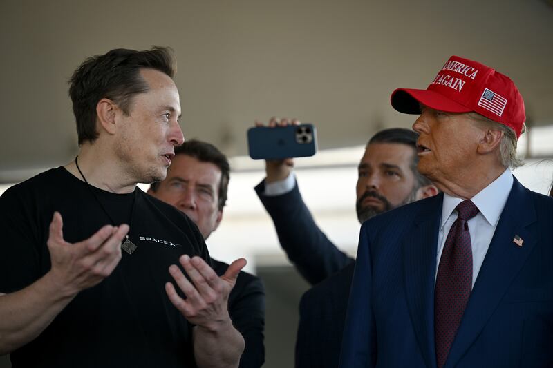 Elon Musk speaks with Donald Trump at a viewing of the launch of the sixth test flight of the SpaceX Starship rocket on November 19, 2024 in Brownsville, Texas.