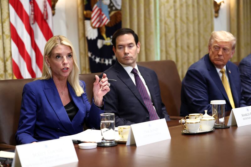 President Donald Trump looks on as Attorney General Pam Bondi answers a question about Jeffrey Epstein during a cabinet meeting at the White House on July 8, 2025.