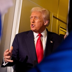 President Donald Trump speaks to members of the media aboard Air Force One on October 30, 2025 in flight. Trump is returning to Washington following a high-stakes meeting with Chinese President Xi Jinping, alongside securing trade deals with ASEAN, Japanese and South Korean partners on his week-long Asian tour.