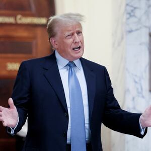 Former U.S. President Donald Trump delivers remarks after exiting the courtroom as he attends his Manhattan courthouse trial in a civil fraud case in New York