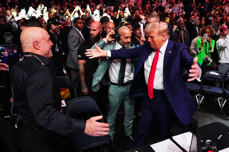 Joe Rogan greets  Donald Trump