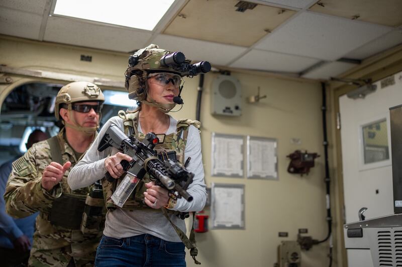 Department of Homeland Security Secretary Kristi Noem is guided by a member of Maritime Security Response Team West in San Diego, Calif., March 16, 2025. Noem visited Coast Guard Cutter Elm (WLB-204) to be a part of a MSRT-W training operation during a visit to the southwest border.