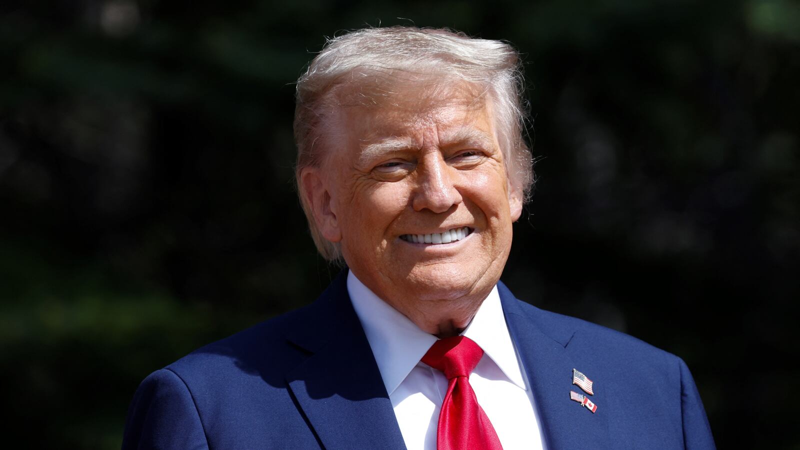 President Donald Trump attends an arrival ceremony during the Group of Seven (G7) Summit at the Pomeroy Kananaskis Mountain Lodge in Kananaskis, Alberta, Canada