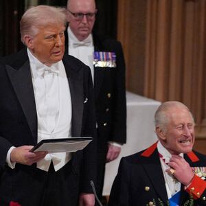 US President Donald Trump delivers his speech as King Charles III and the Princess of Wales listen