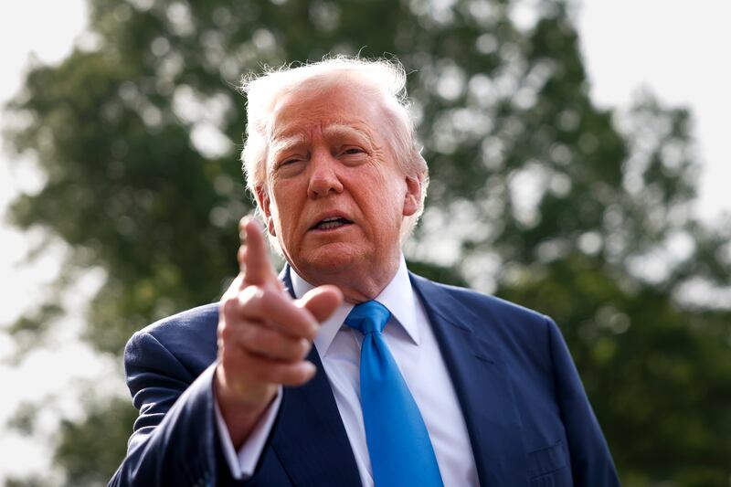 U.S. President Donald Trump speaks to the media as he departs the White House on April 25, 2025 in Washington, DC.