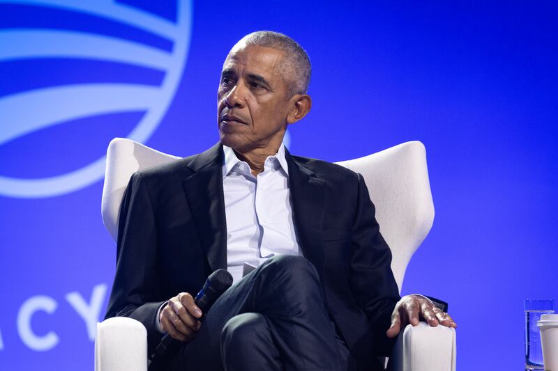 Former President Barack Obama moderates a conversation with Manu Meel, Co-Founder and CEO of BridgeUSA, Ainka Jackson, Founding executive director of the Selma Center for Nonviolence, Truth, and Reconciliation and Nika Kovač, Director of Slovenia-based Institute 8th of March during the Obama Foundation's 2024 Democracy Forum on December 05, 2024 in Chicago, Illinois.
