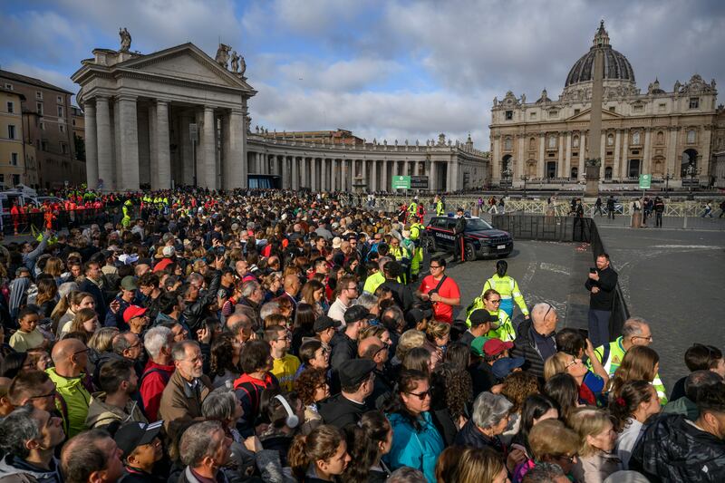 Faithful join a long line outside St Peter's Square to view the body of Pope Francis laying in state inside St Peter's Basilica, on April 25, 2025 in Vatican City, Vatican. Pope Francis, who died on April 21 aged 88, is lying in state for a final day ahead of Saturday’s funeral in St. Peter's Square.