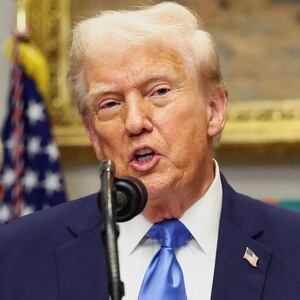 U.S. President Donald Trump, in front of U.S. Secretary of Health and Human Services Robert F. Kennedy Jr., delivers remarks at the White House, in Washington, D.C., U.S., September 22, 2025. REUTERS/Kevin Lamarque