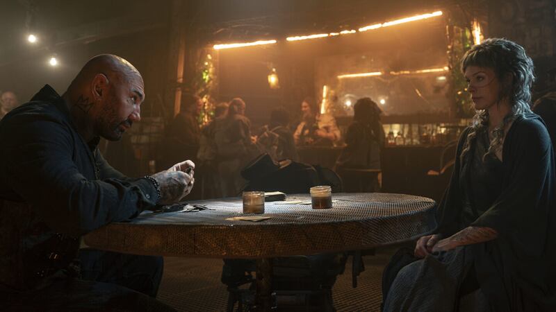 Dave Bautista and Milla Jovovich.