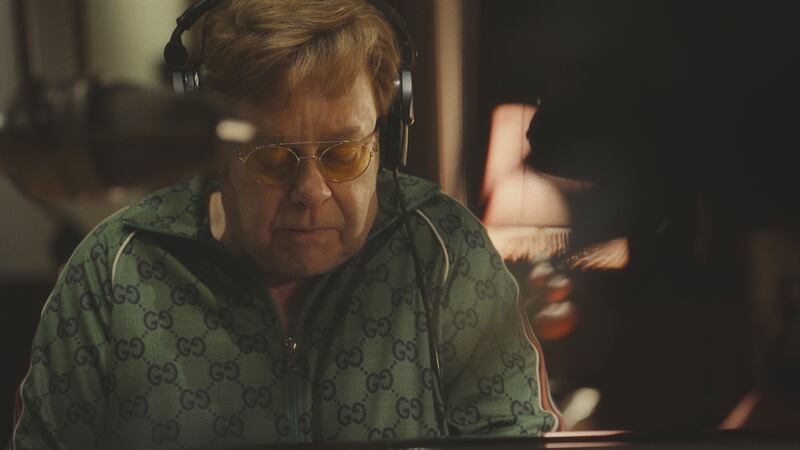 Elton records his hit song "Hold Me Closer" at a Toronto recording studio with music producer Andrew Watt.