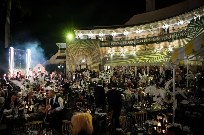 PALM BEACH, FLORIDA - OCTOBER 31: US President Donald Trump talks with guests during a Halloween party at his Mar-a-Lago estate on October 31, 2025 at Palm Beach, Florida. Trump is spending the weekend at his Mar-A-Lago estate in Palm Beach, Florida. (Photo by Samuel Corum/Getty Images)