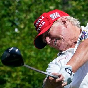 Former US President and 2024 presidential hopeful Donald Trump plays golf ahead of the LIV Golf Invitational series  tournament at Trump National Golf Club Bedminster in Bedminster, New Jersey, on August 9, 2023.