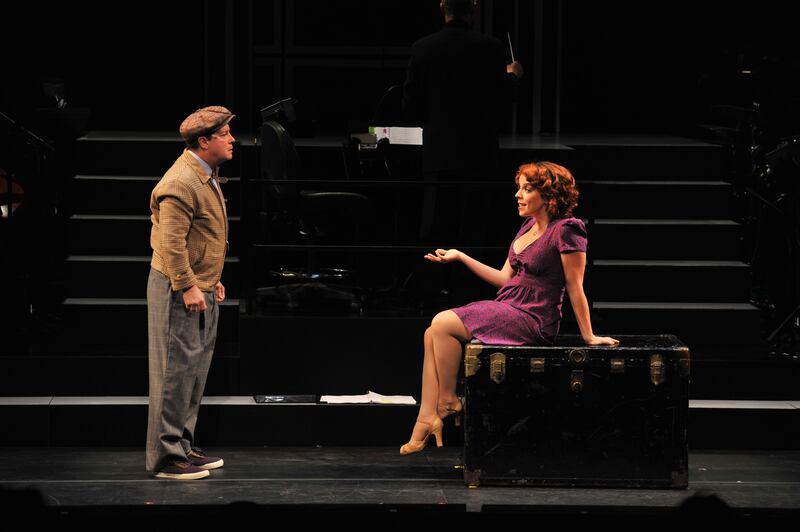 Michael McGrath (Dromio of Ephesus), L, and Leslie Kritzer (Luce) act out a scene during dress rehearsal for Rodgers and Hart's "The Boys of Syracus\" at the Shakespeare Theatre Company's Sidney Harman Hall on November 3, 2011, in Washington, DC.