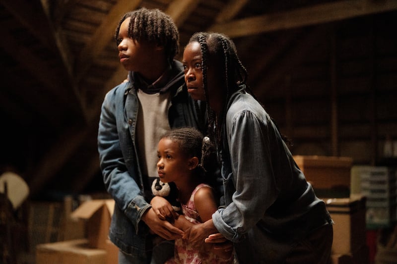 Peyton Jackson, Estella Kahiha and Danielle Deadwyler in The Woman in the Yard.