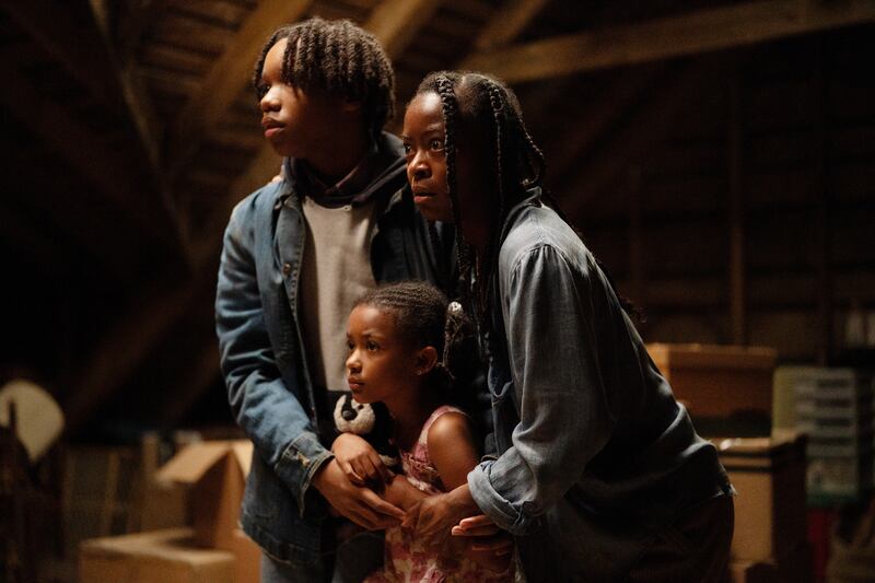 Peyton Jackson, Estella Kahiha and Danielle Deadwyler in The Woman in the Yard.