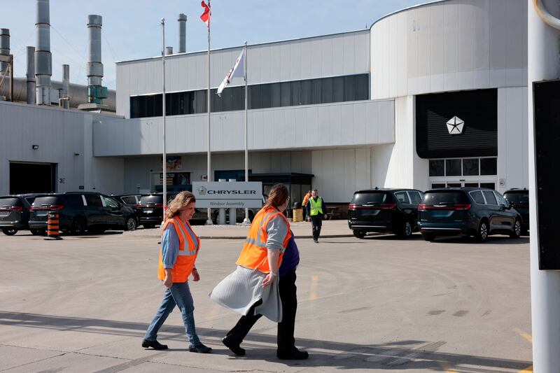 Workers walk outside of the Stellantis Windsor Assembly Plant in Windsor, Ontario, Canada, on April 3, 2025