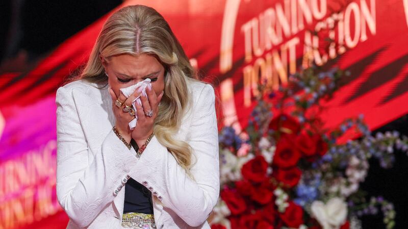 Erika Kirk wipes away tears during the memorial service for her husband, political activist Charlie Kirk at State Farm Stadium on September 21, 2025 in Glendale, Arizona.
