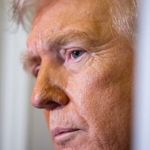 US President Donald Trump speaks to journalists aboard Aire Force One as he travels from West Palm Beach back to Washington on March 9, 2025. (Photo by ROBERTO SCHMIDT / AFP) (Photo by ROBERTO SCHMIDT/AFP via Getty Images)