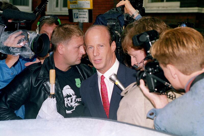 John Bryan, mobbed by tabloids, in 1992.