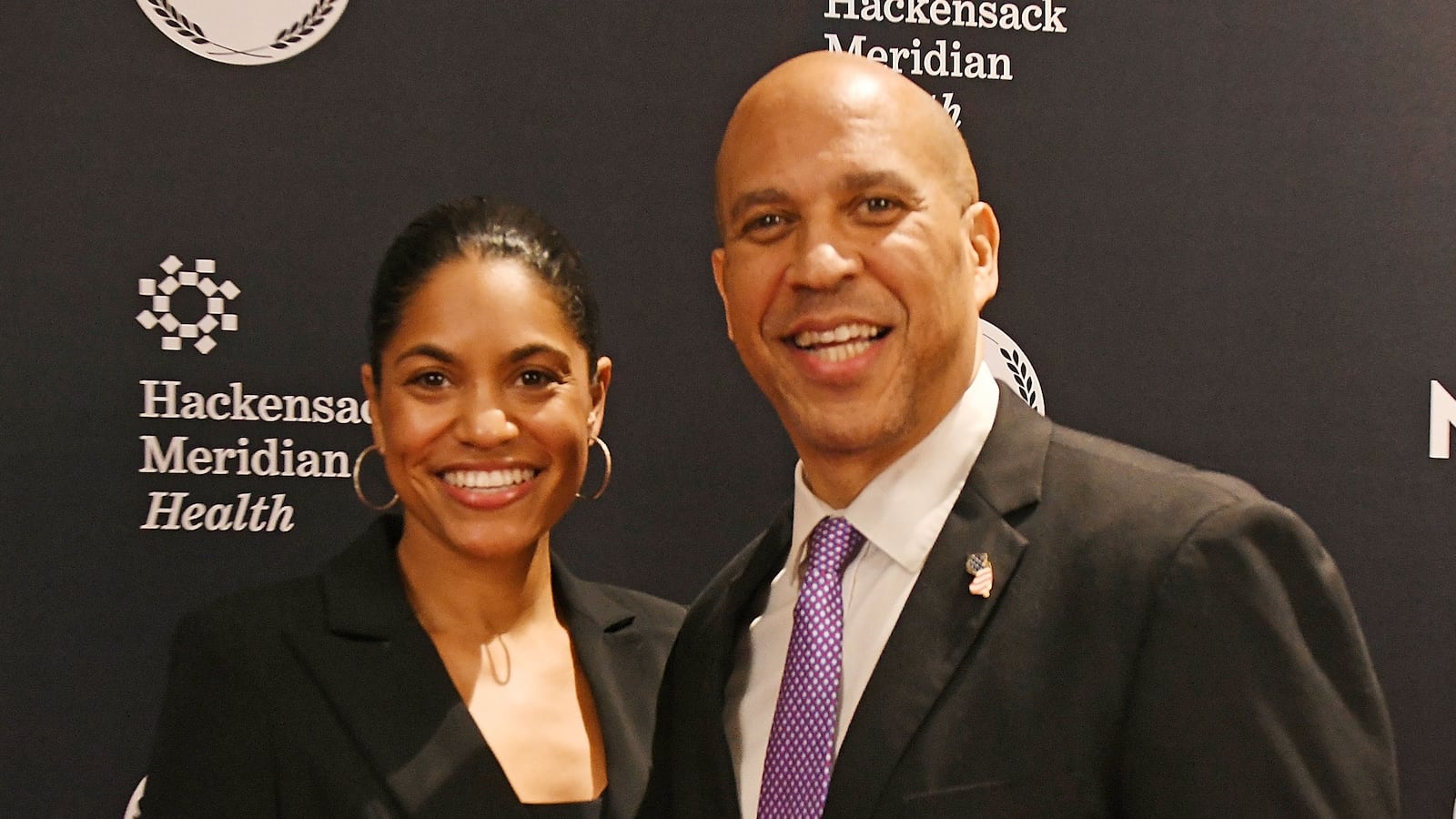 EAST RUTHERFORD, NJ - NOVEMBER 21: Senator Cory Booker and Alexis Lewis attends the 2025 New Jersey Hall Of Fame Induction Ceremony at American Dream on November 21, 2025 in East Rutherford, New Jersey.