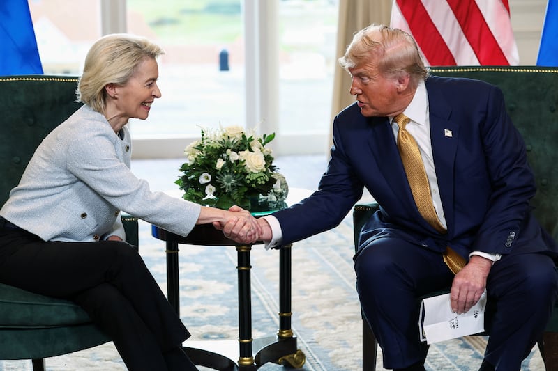 U.S. President Donald Trump shakes hands with European Commission President Ursula von der Leyen, after an announcement of a trade deal between the U.S. and EU, in Turnberry, Scotland, Britain, July 27, 2025. REUTERS/Evelyn Hockstein