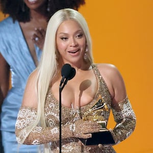 Beyoncé accepts the Best Country Album award for “Cowboy Carter” from Taylor Swift