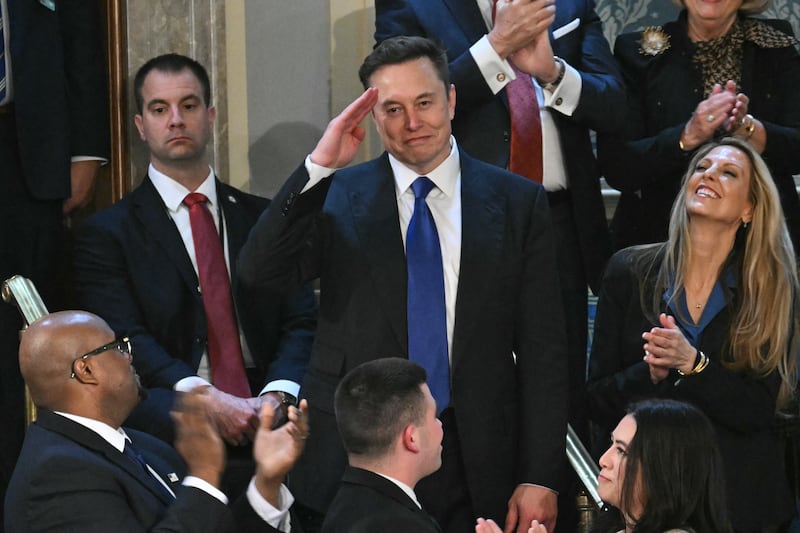 Elon Musk stands as he is recognized by US President Donald Trump during Trump's address to a joint session of Congress at the US Capitol in Washington, DC, on March 4, 2025.