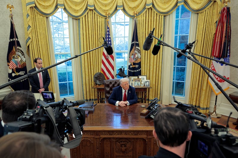 WASHINGTON, DC - JANUARY 30: U.S. President Donald Trump talks to reporters from the Resolute Desk after signing an executive order to appoint the deputy administrator of the Federal Aviation Administration in the Oval Office at the White House on January 30, 2025 in Washington, DC. Trump also signed a memorandum ordering an immediate assessment of aviation safety and ordering an elevation of what he called “competence” over “D.E.I.” (Photo by Chip Somodevilla/Getty Images)
