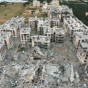 A photo including an aerial view showing the destruction caused by Israeli strikes in Wadi Gaza, in the central Gaza Strip