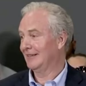 Senator Chris Van Hollen giving a press conference