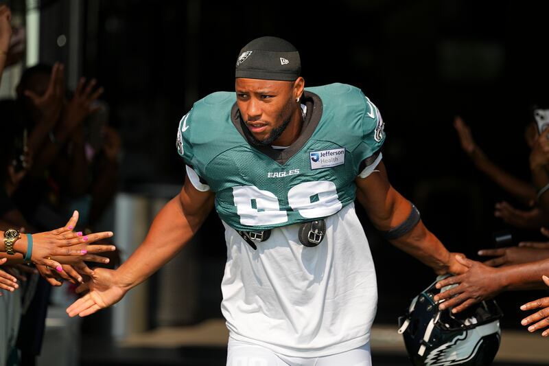 Saquon Barkley is a running back for the Philadelphia Eagles, and broke the record for most rushing yards in one season, leading up to the team's Super Bowl win in 2025.