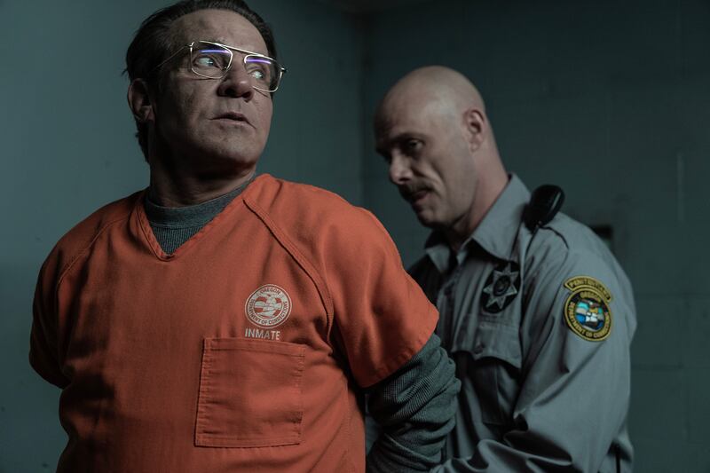 Dennis Quaid as Keith Jesperson and Charles Zuckermann as C.O. Bassett in Happy Face.