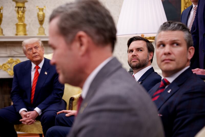 (L-R) U.S. President Donald Trump, U.S. National Security Adviser Michael Waltz, U.S. Vice President J.D. Vance, and Defense Secretary Pete Hegseth, listen to a question from a reporter during a meeting in the Oval Office of the White House on March 13, 2025 in Washington, DC.